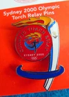 SYDNEY OLYMPIC GAMES 2000 TORCH RELAY RED CIRCLE FLAME RUNNING MAN LOGO PIN