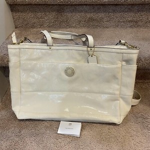 white leather diaper bag