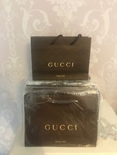 Brand New And Sealed 100% Genuine Gucci Brown Embossed Gift Bag.