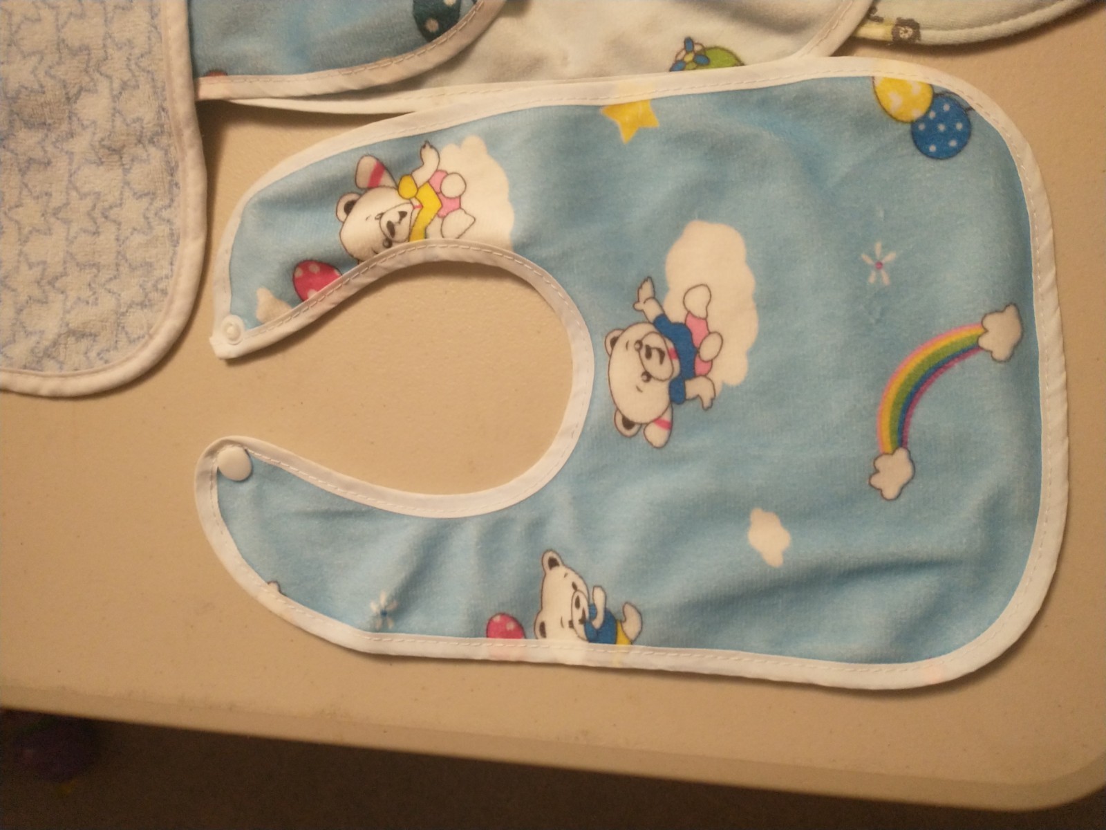 lot of 11 baby bibs some Neat Solutions cats rabbits bears ballons beach rainbow