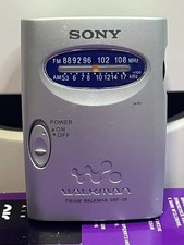 Sony Walkman FM/AM Radio SRF-59 Silver Gray W/ Belt Clip Used Working Tested