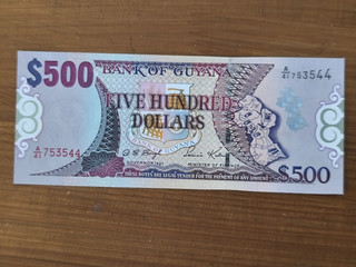 Guyana 500 dollars risque déchirure pliure etc..