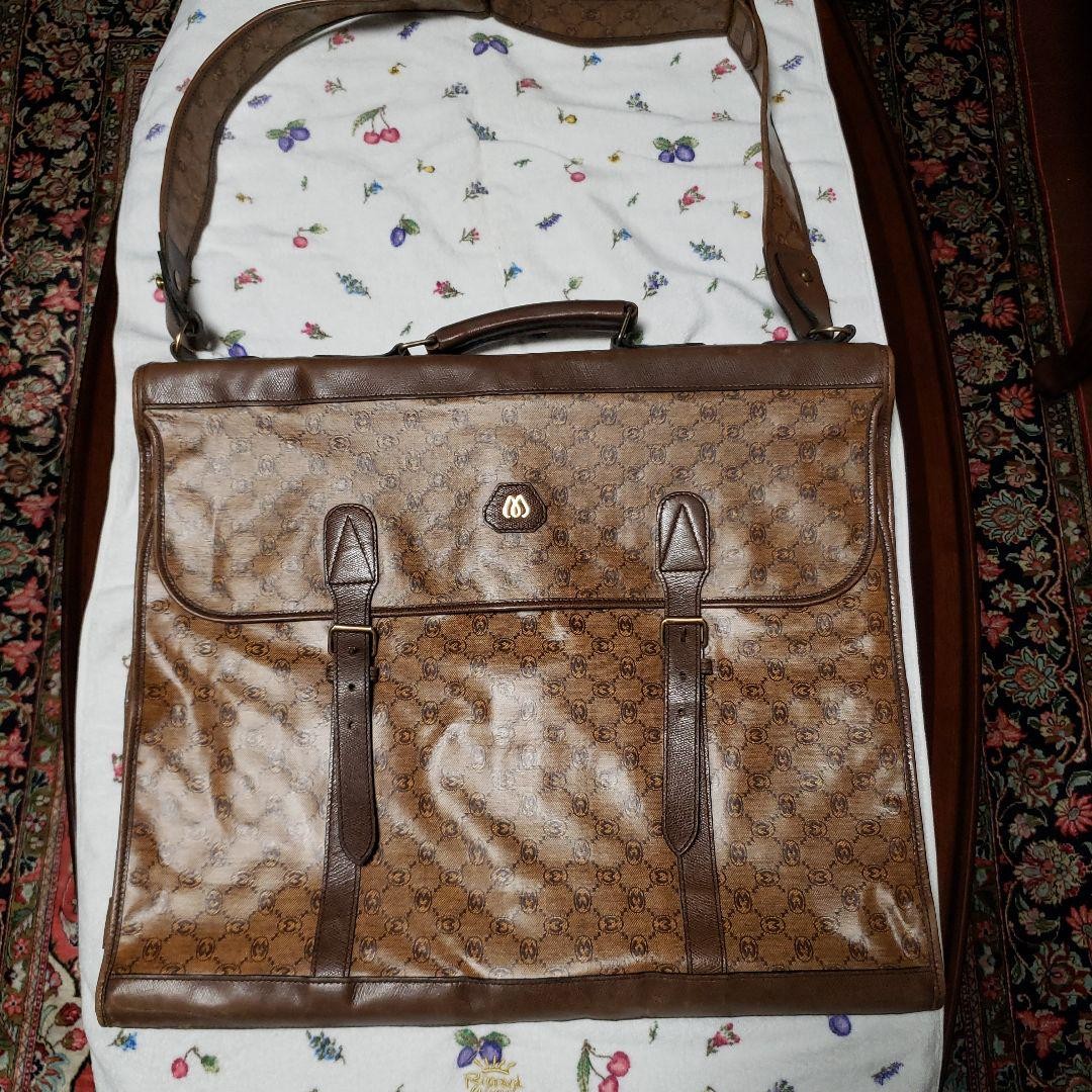 Vintage Brown Gucci Garment Bag for Travel and Storage