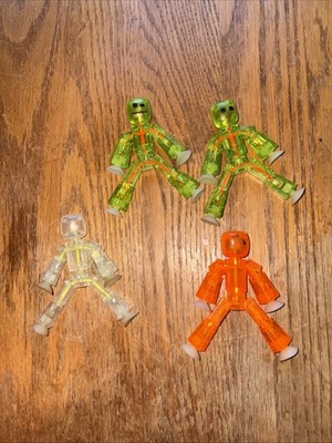 4 Stikbot ROBOT Stop Motion Animation 3  Action Figures. Green, Clear, Orange.