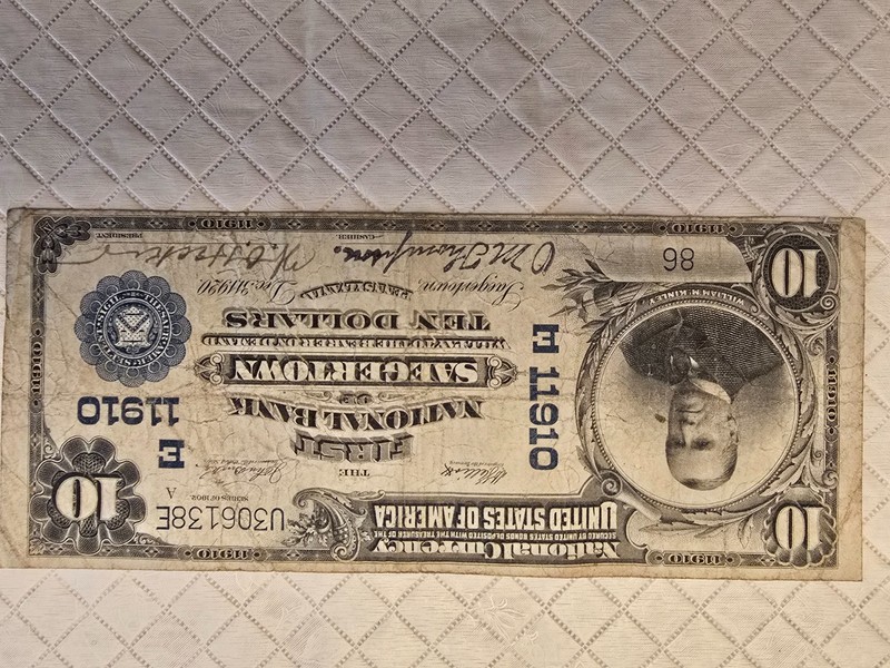 1902 series  10-dollar bill from the First National Bank of saegertown Blue Seal