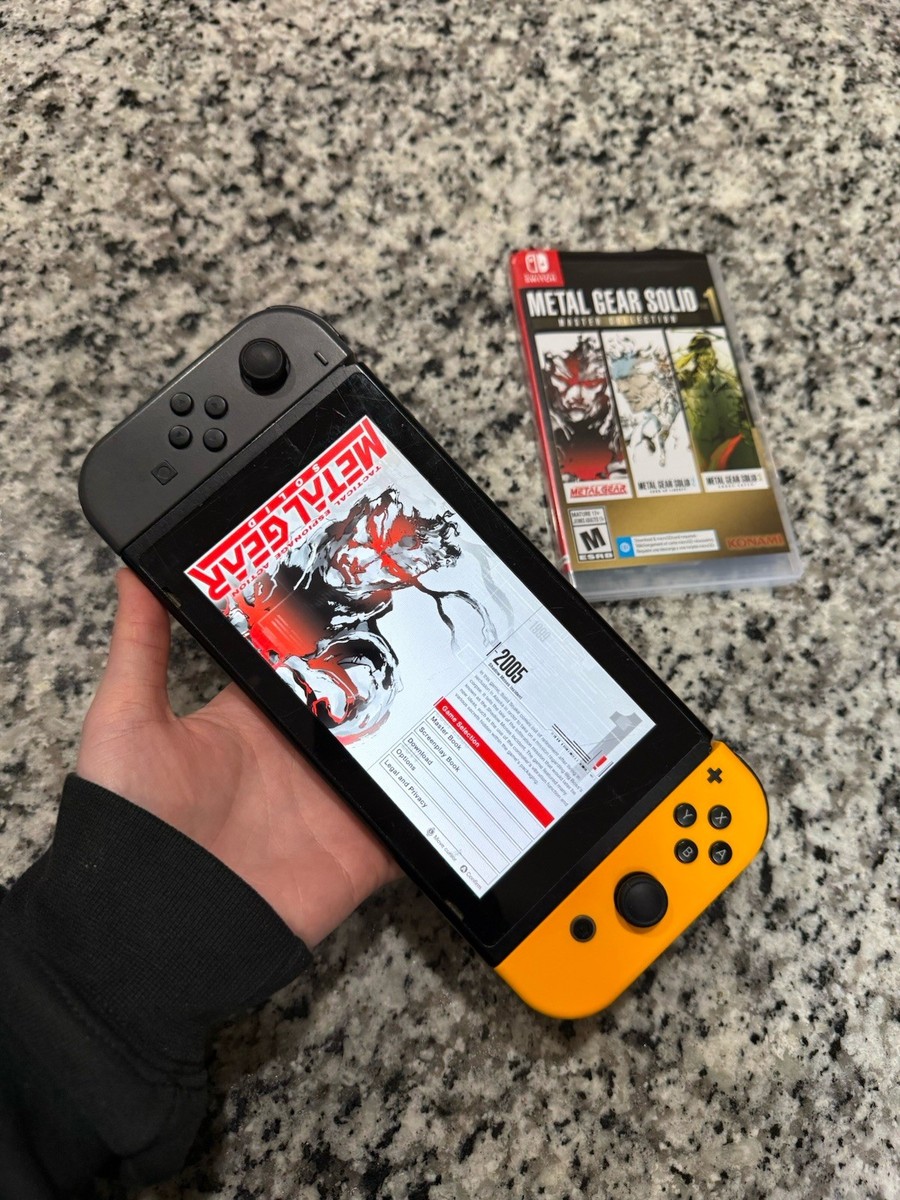 Nintendo Switch with Gray & Neon Orange Joy-Cons(HAC-001-01) & Pro