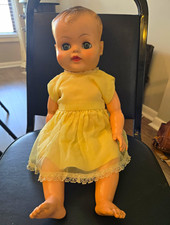 1960s Baby Doll Blue Eyes Light Complexion Straight Brown Hair Yellow Dress