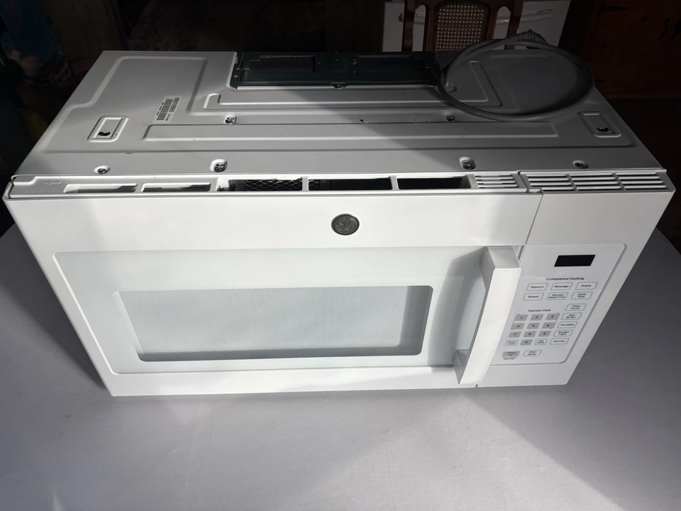 Horno microondas GE blanco sobre la gama 1,6 cúbicos Ft. 1000 vatios NUEVO PROBADO FUNCIONANDO Foto 2 de 4