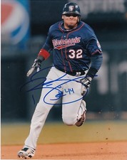 RENE RIVERA  MINNESOTA TWINS   ACTION SIGNED 8x10
