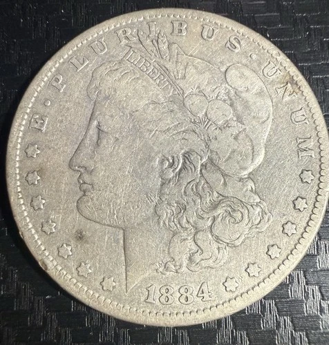 1884 Morgan Silver Dollar $1 Business Strike Circulated Uncertified 0.9 Fine