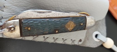 3 1/2 '' folding knife made in N.Y. by CAMILLUS very collectable with custom leat