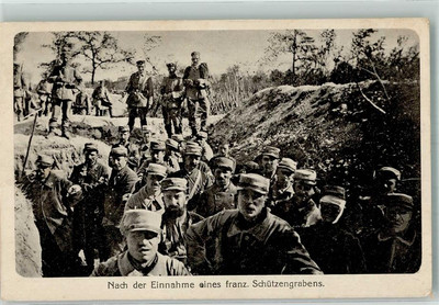 39882487 - French prisoners are led away from a trench