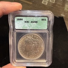 1886 U.S. $1 Morgan Silver Dollar ICG AU58