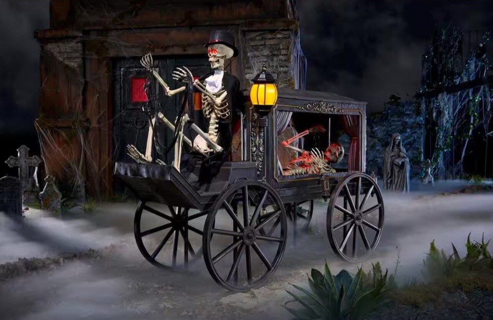 Home Accents Holiday 5 ft. Animated LED Hearse And 5.5 Ft. LED Skeleton