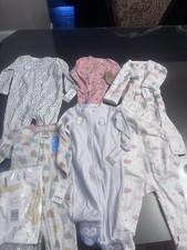 Carter  s Baby Girl Bundle of Sleepers - 7 Pairs of Footie Pajamas, 9 Months