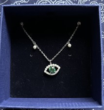 SWAROVSKI CRYSTAL LUCKILY NECKLACE GREEN EVIL EYE PENDANT CRYSTAL PEARLS RHODIUM