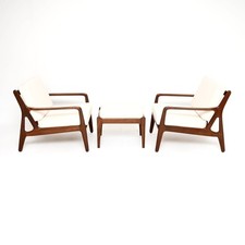 Pair of Danish Vintage Afromosia Armchairs and Stool by Arne Vodder