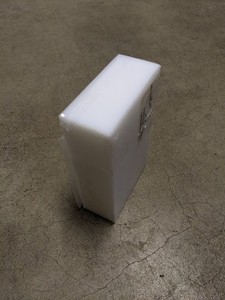 White Delrin rectangle 7"x2"x4-1/2"