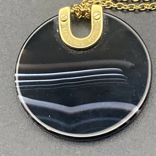 Collana firmata Michael Kors paesaggio urbano disco tono oro ciondolo agata nera