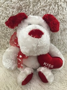 red and white stuffed dog