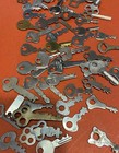 Lot of 60 Coin-op Keys Many small ones and other vintage trade and machine types — photo 2