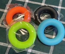 NEW 4 Pack Hand Grip Strengthener Rings Finger Exerciser Grip Strength Trainer