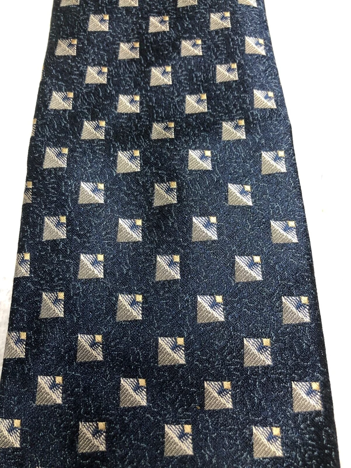 CORBATA ROUNDTREE AND YORKE PARA HOMBRE AZUL MARINO CON ORO GRIS 4 X 60 Foto 3 de 4