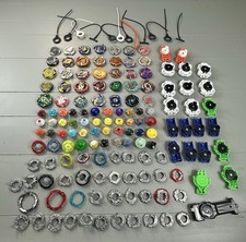 BEYBLADES Mixed Lot of 150 Parts Pieces Launchers Spinners Metal and Plastic