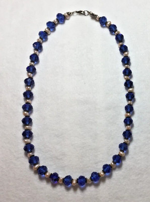 Lovely necklace with royal blue AB beads & small pearls & silver findings.