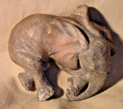 SLEEPING ELEPHANT FIGURINE BY LIVING STONE, LYING DOWN, GRAY, SANDCAST