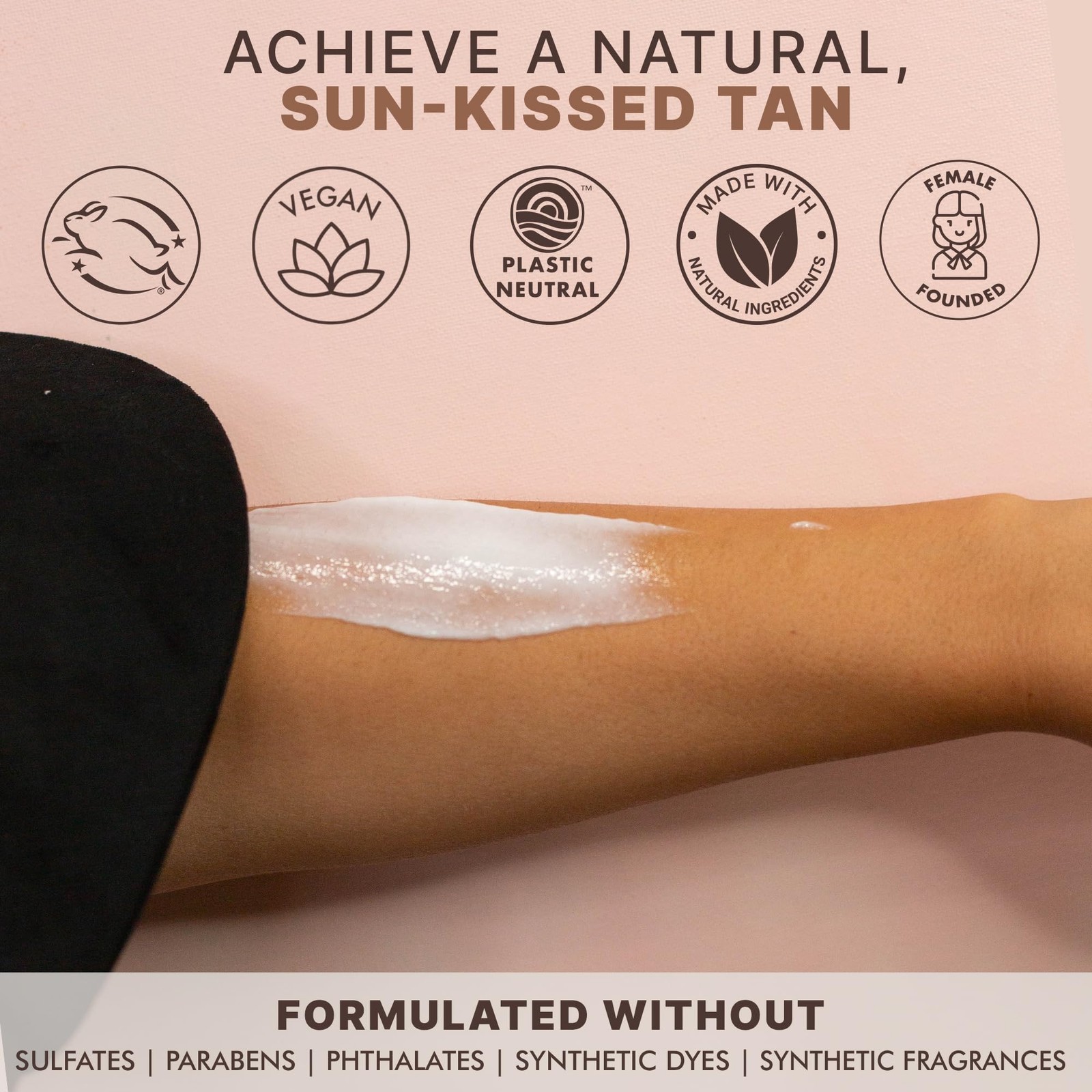 White Beauty by Earth Self Tanner bottle with pink cap, blue text “Made with Natural Ingredients,” and tan armpit sample.