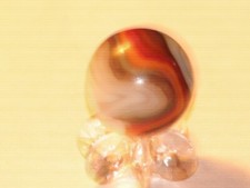 Large .850 unknown maker multicolor marble, excellent condition.
