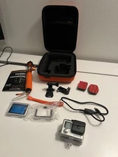 GoPro Hero 4 with Accessories, Memory Card, & Grip Handle