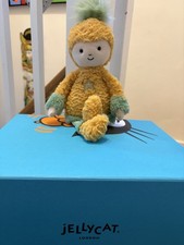 This image shows the retired Jellycat Perky Pineapple Top plush dol