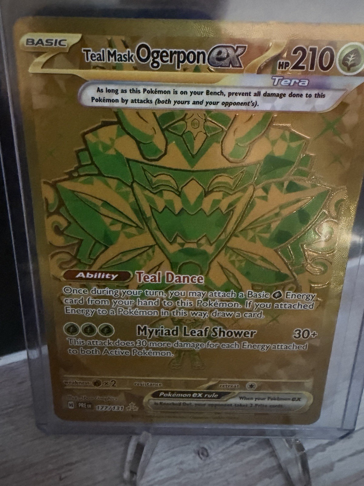 Teal Mask Ogerpon ex 177/131 – Gold Full Art – SV06 Prismatic Evolutions Pokémon