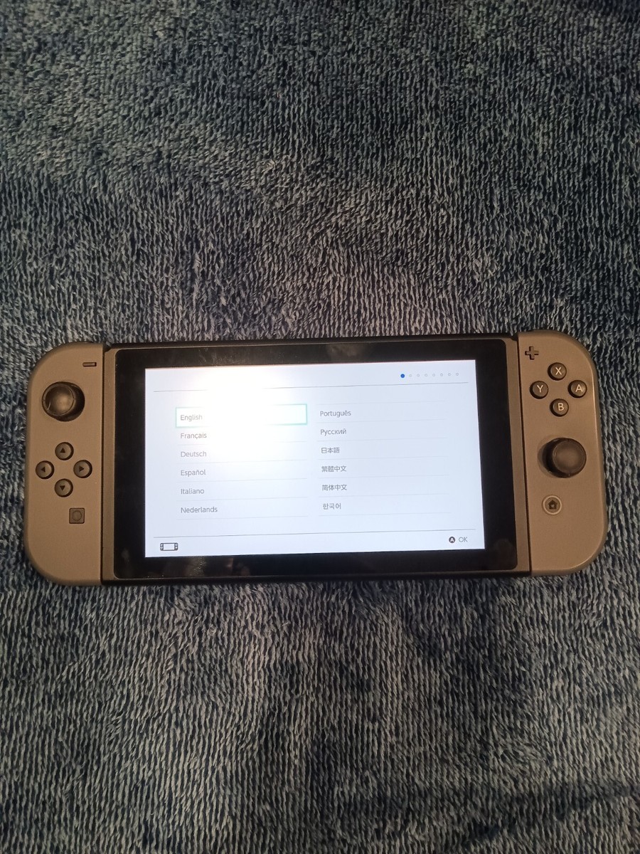 Nintendo Switch Gray with joy con, extra controller, games, ready