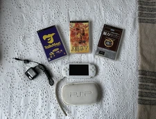 White Sony PSP 1000 bundled with 3 games, charger and manual (bought in Japan)