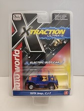 AUTO WORLD 1979 Jeep CJ-7 Blue Topless Xtraction Electric Slot Car HO Scale NEW