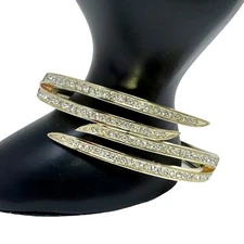 Gold Tone Hinged Bangle Bracelet With Linear Rhinestones Claw Design