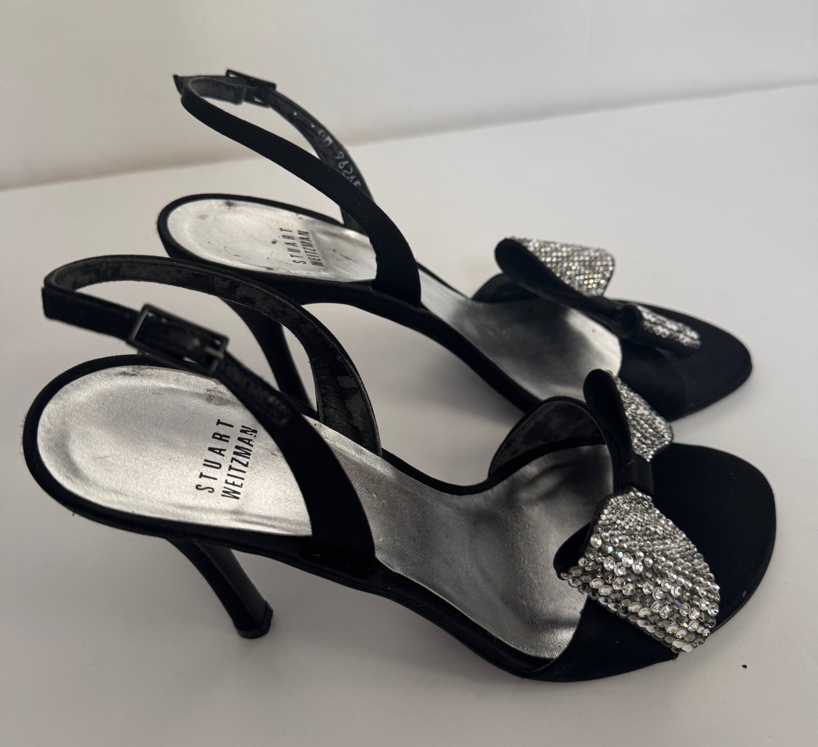 Black Satin STUART WEITZMAN Whatabow Pump With Swarovski Crystal Bow