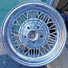 VINTAGE 15" x 7" TRU-SPOKE CHROME UNILUG WIRE WHEEL. 5 LUG x 4.5", 4.75", & 5".