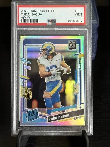 2023 Panini Donruss Optic - Rated Rookie Puka Nacua #238 Holo Prizm (RC) PSA 9