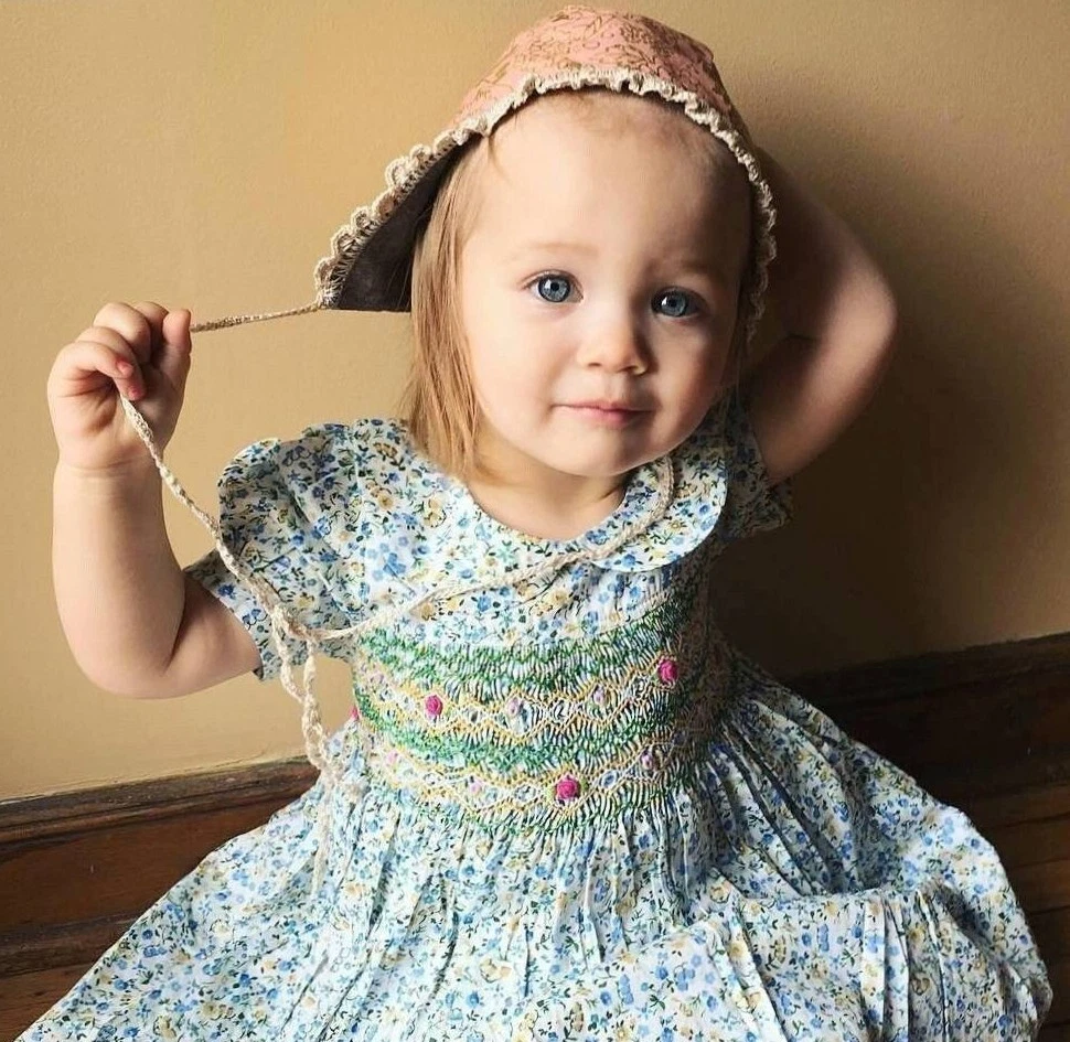 Little girl top dresses with smocking