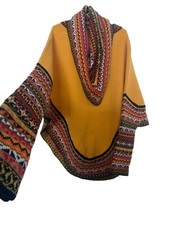 Peruvian Alpaca Wool Poncho with sleeves and scoop neck.
