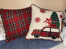 Set up two decorative pillows Christmas plaid car with tree and presents on top