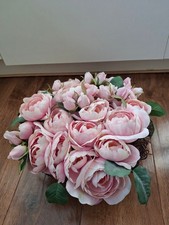 Beautiful massed artifical pink roses & rosebuds in a round wicker basket Used