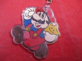 Mario w/ Star - Super Mario Bros. Nintendo NES 1988 Plastic Keychain