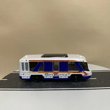 2016 Matchbox #12/125 Swift Shuttle Airport Bus White/Blue Metal 1:64 NM