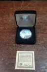 The Morgan Mint us 2001 hologram silver eagle
