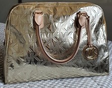 Borsa Michael Kors color oro usata